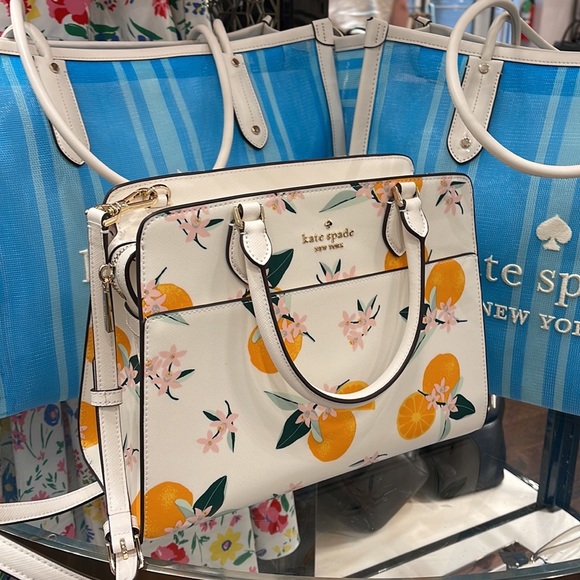 kate spade Handbags - Kate Spade Madison Orange Toss Medium Satchel
COLOR:
Cream Multi
NWT